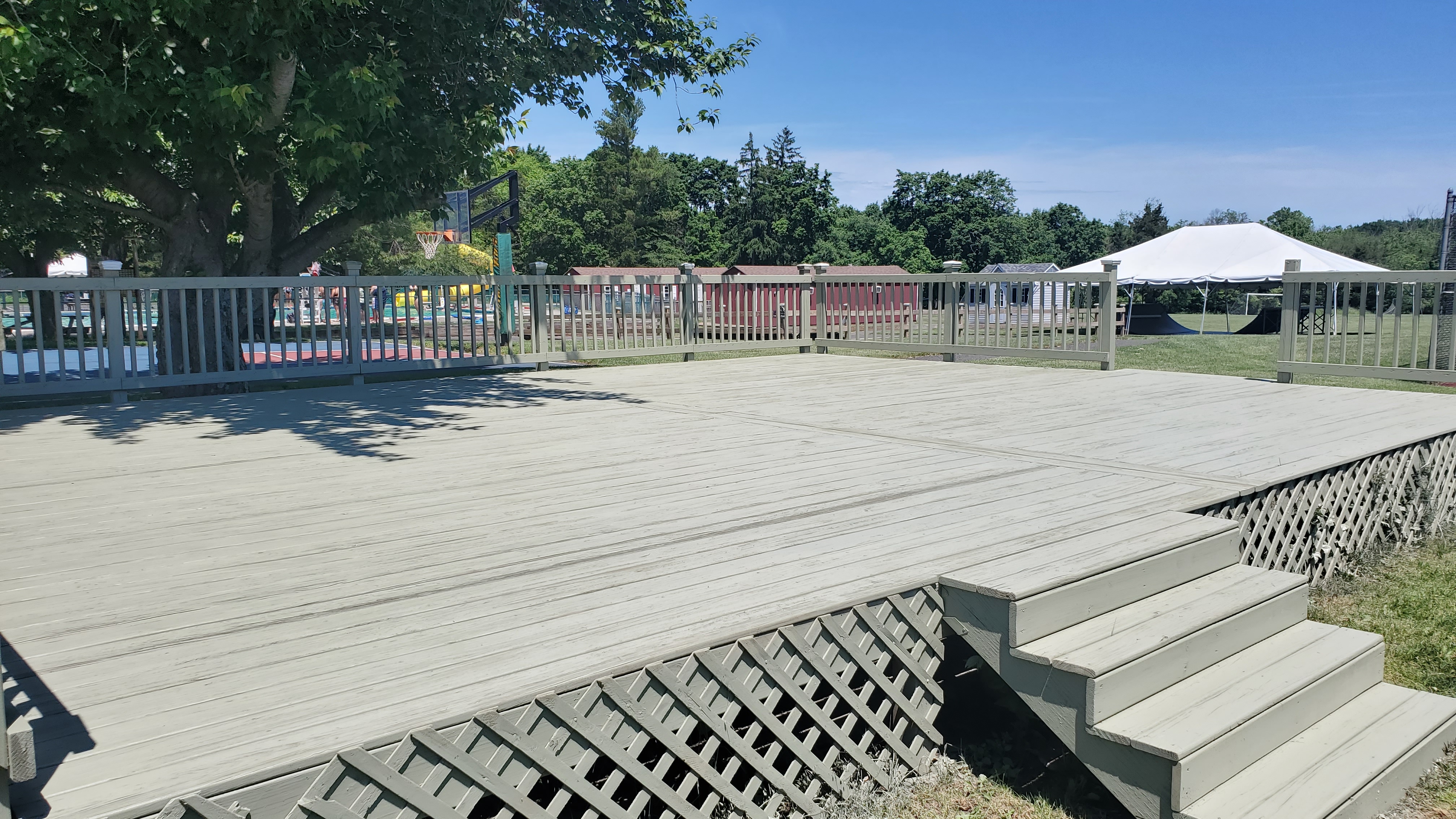 Commercial deck stained and restored to warm natural wood tone